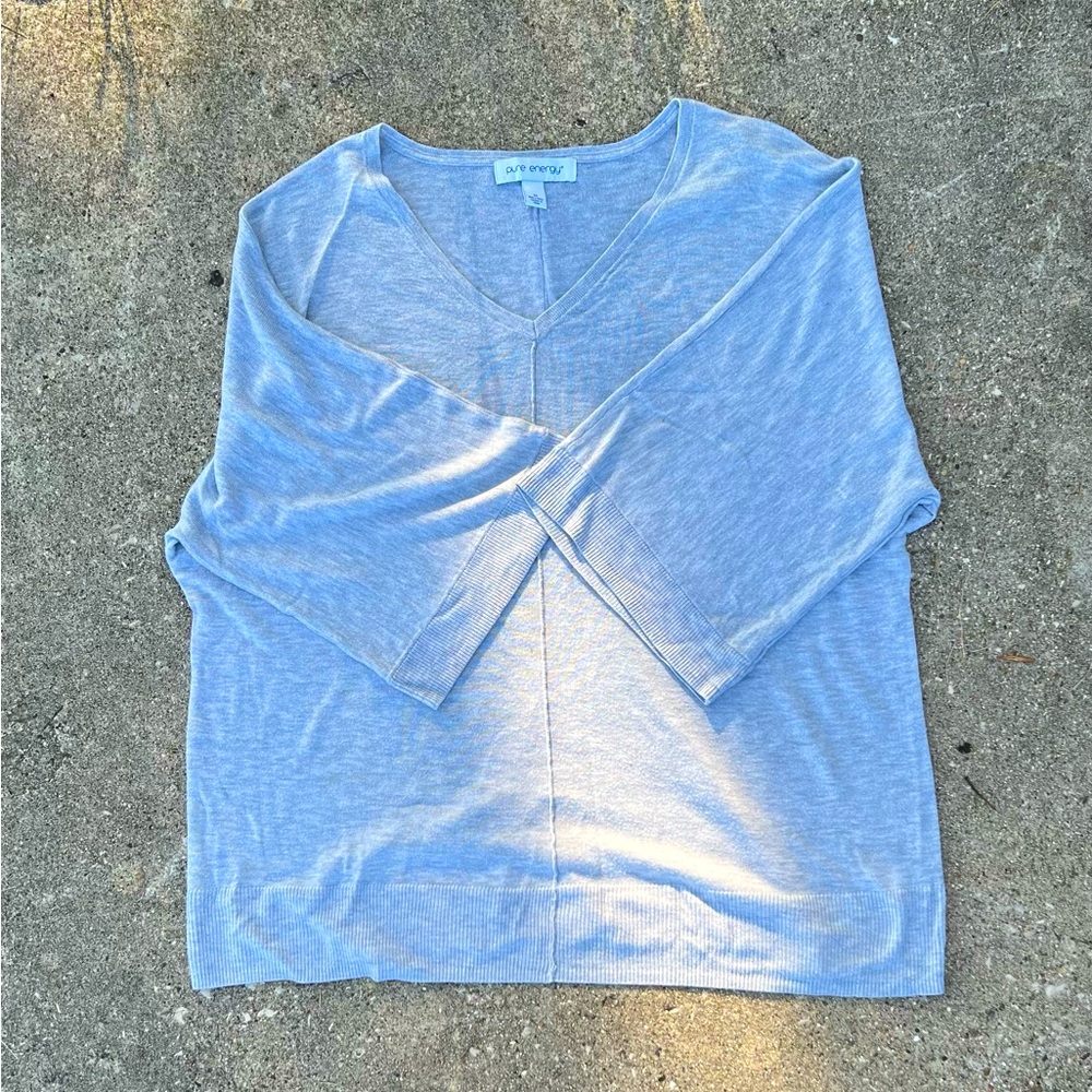 Light gray sweater with bell sleeves